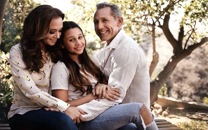Sofia Bella Pagan with her parents Leah Remini and Angelo Pagan.